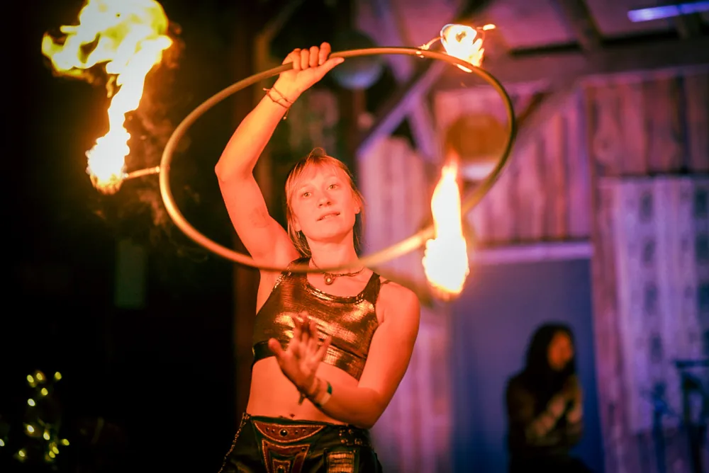 Eva spinning a burning hula hoop