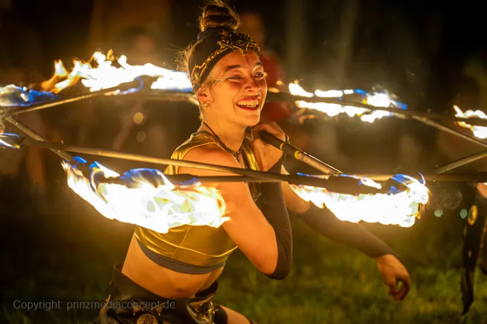 Mascha spinning a burning hoop