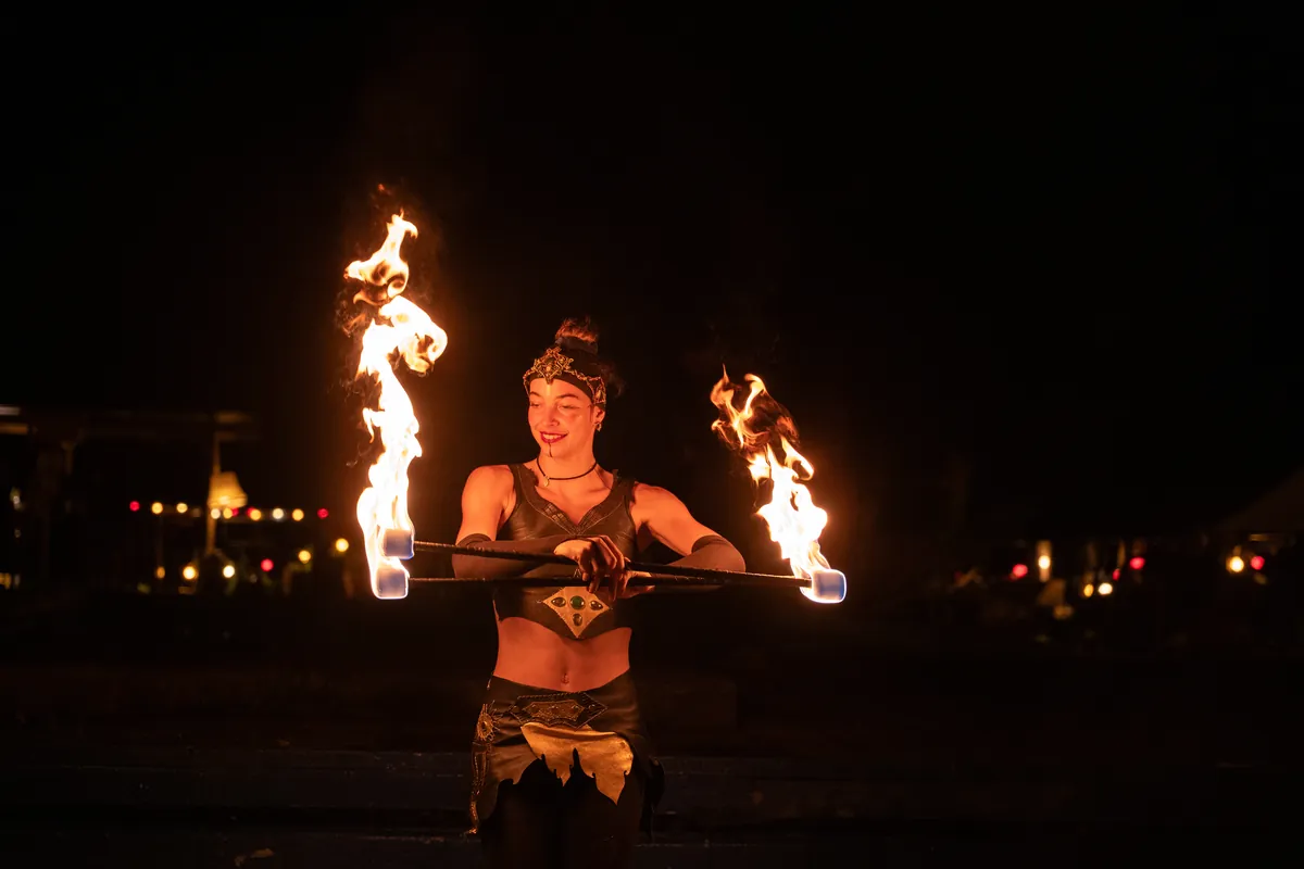 Mascha performing with fire at night